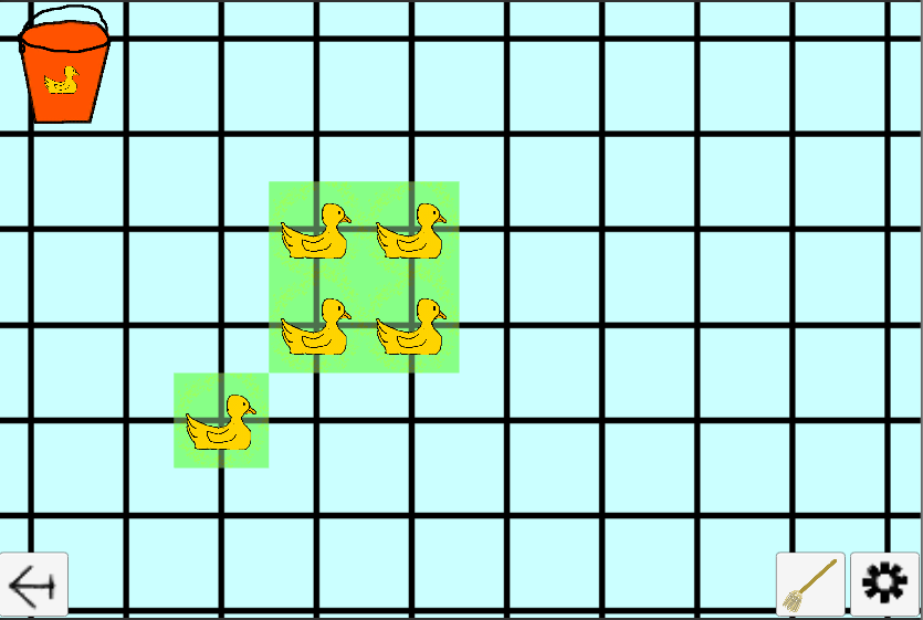 Screenshot of ducks on a grid. A bucket labelled with a duck in one corner