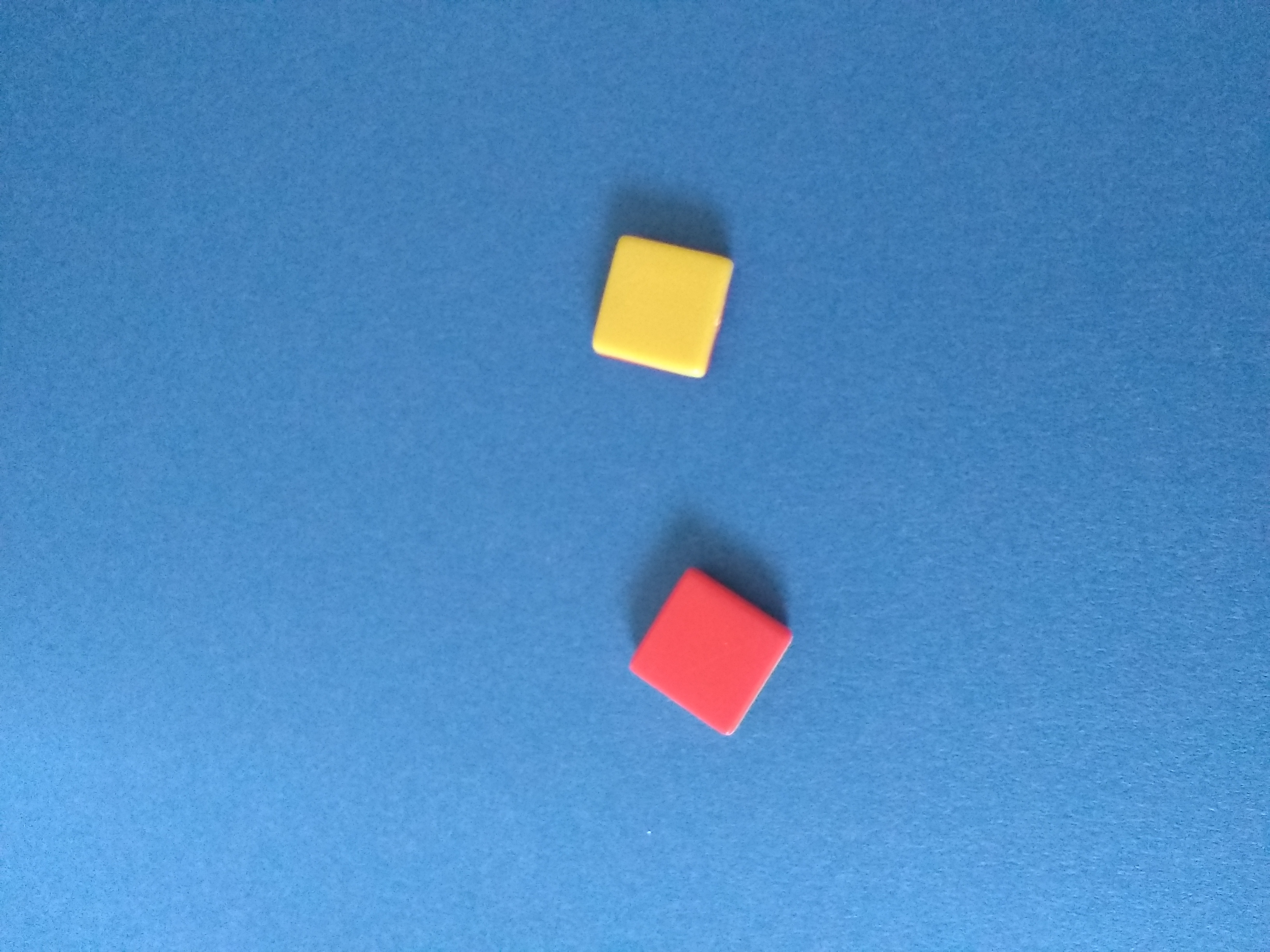 one red square and one off-white square