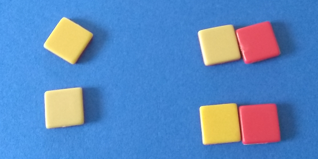 the same counters, 4 positive, 2 negative, with 2 positive on the left and 2 pairs of zero (one positive, one negative) on the left