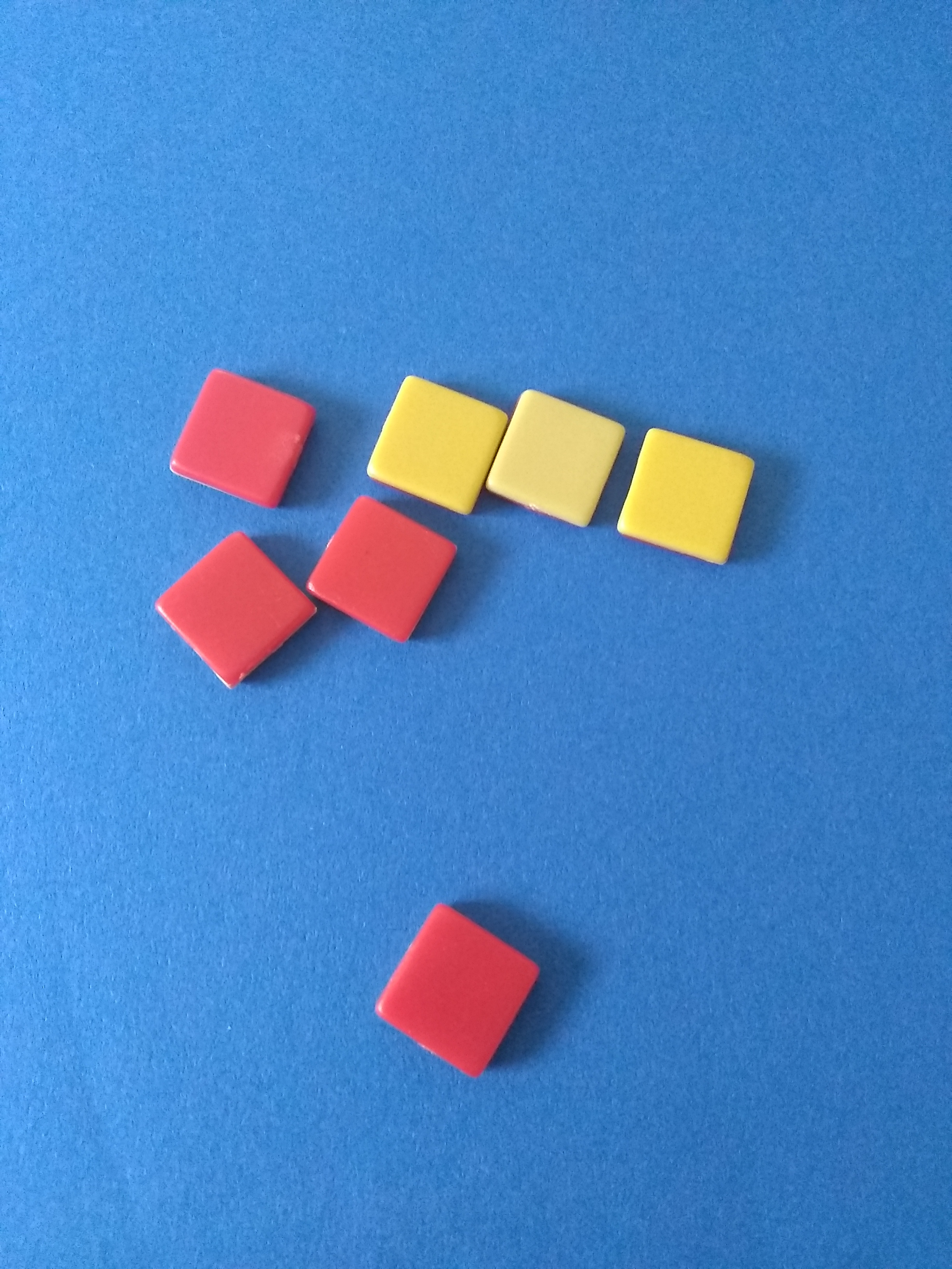 four red squares and 3 off-white squares
