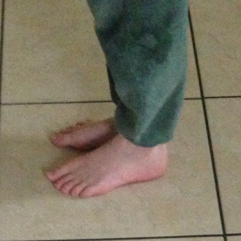 feet on a tile floor